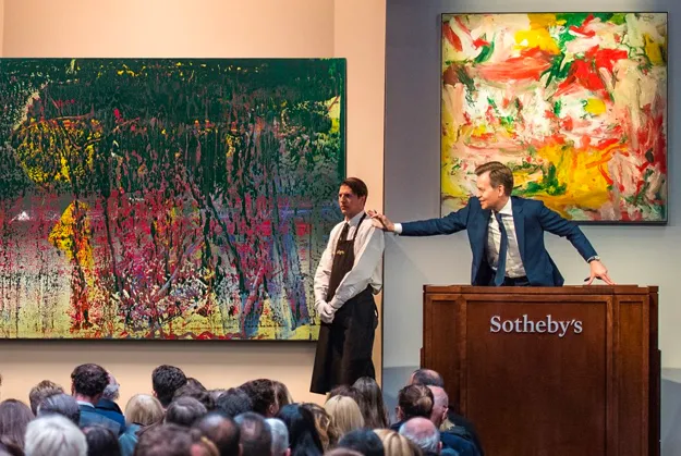 Art auction at Sotheby’s with colorful paintings