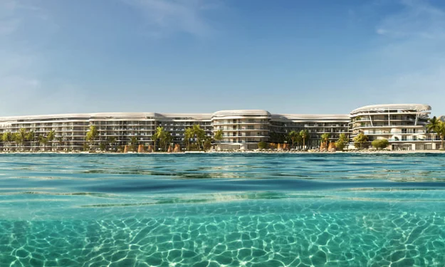 St. Regis Al Mouj exterior at sunset