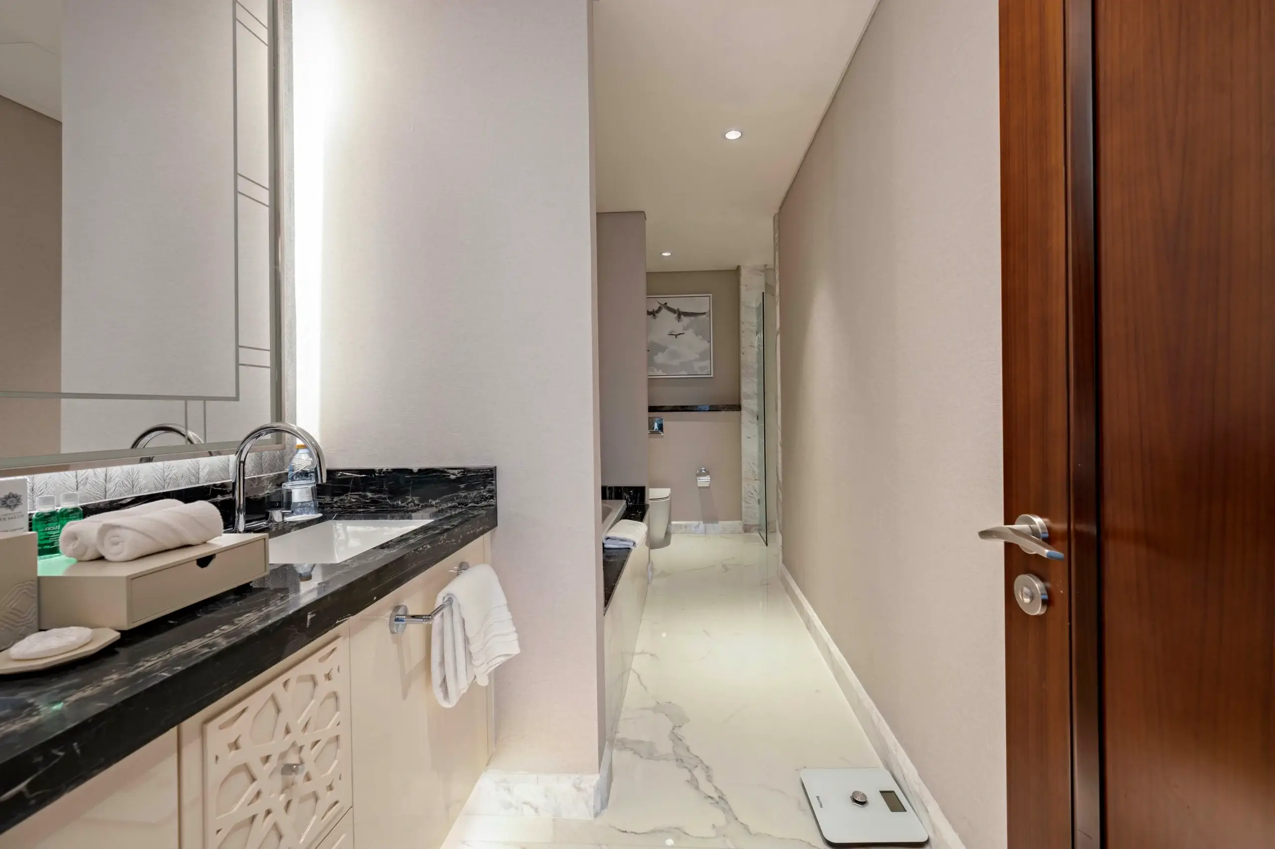 A luxurious bathroom with a large vanity.