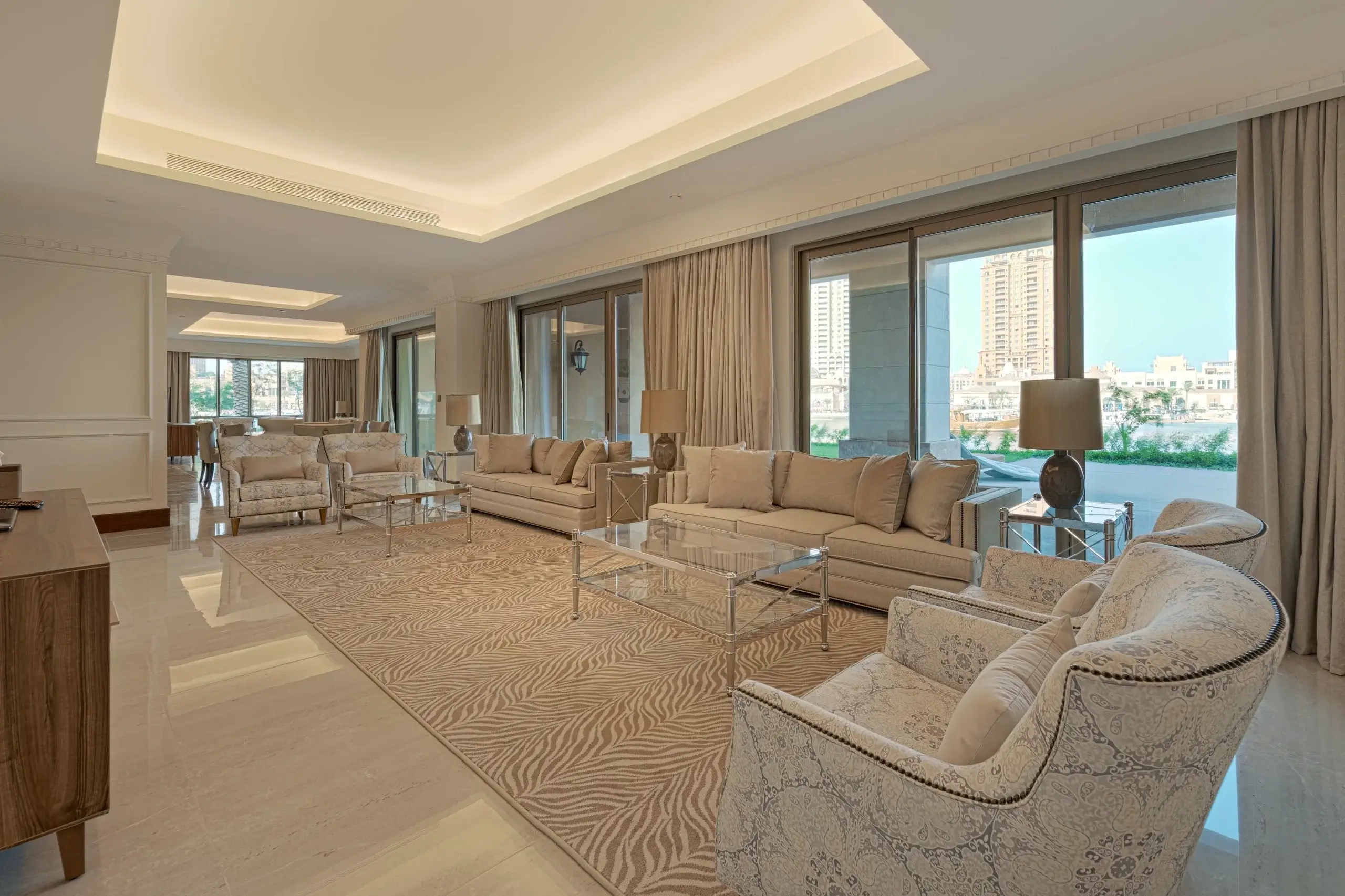 A large living room with multiple sofas