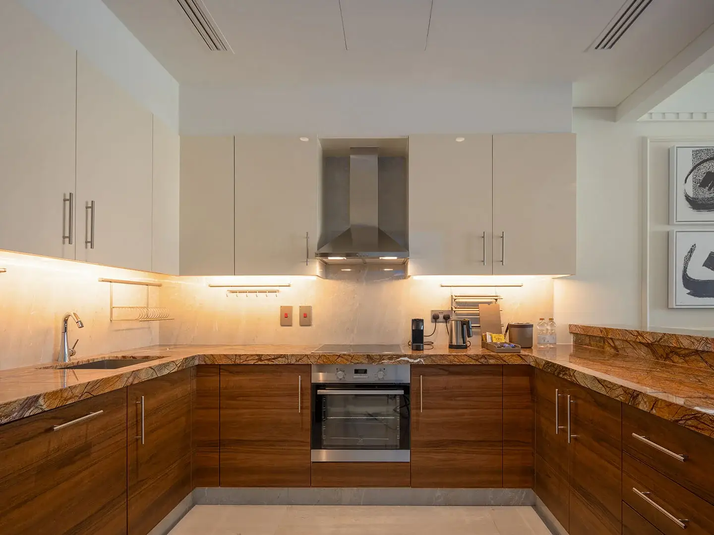 Modern kitchen with wood and granite.