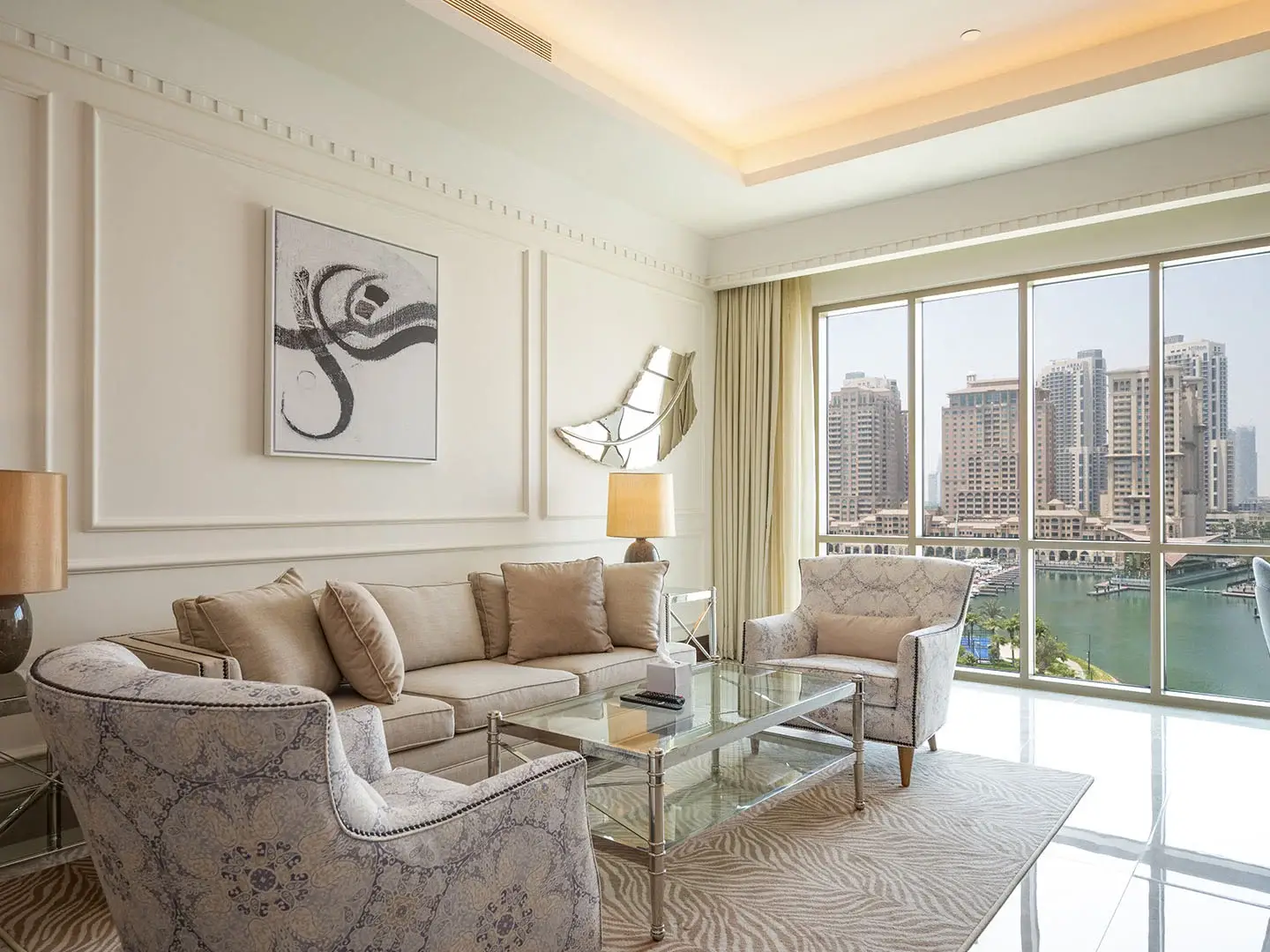 Living room with city and water views.