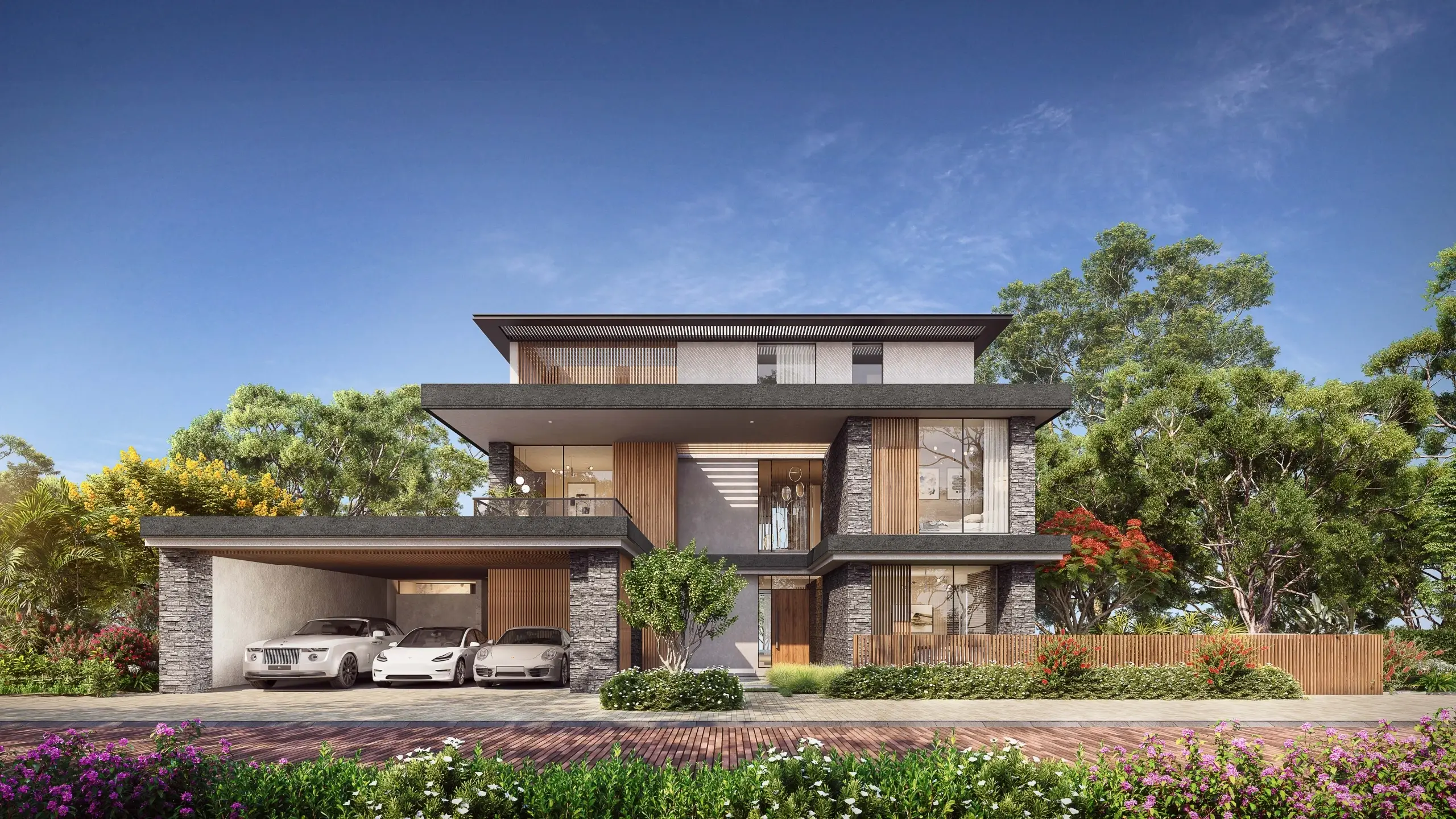 A modern house with a carport and lush greenery.