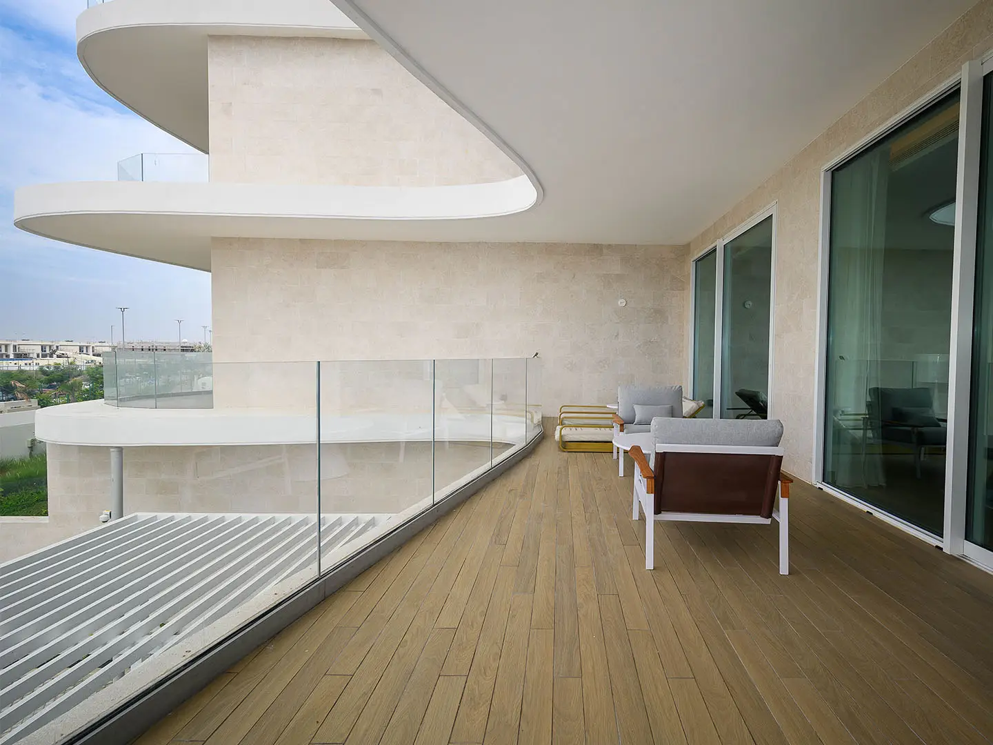 A curved outdoor patio with seating