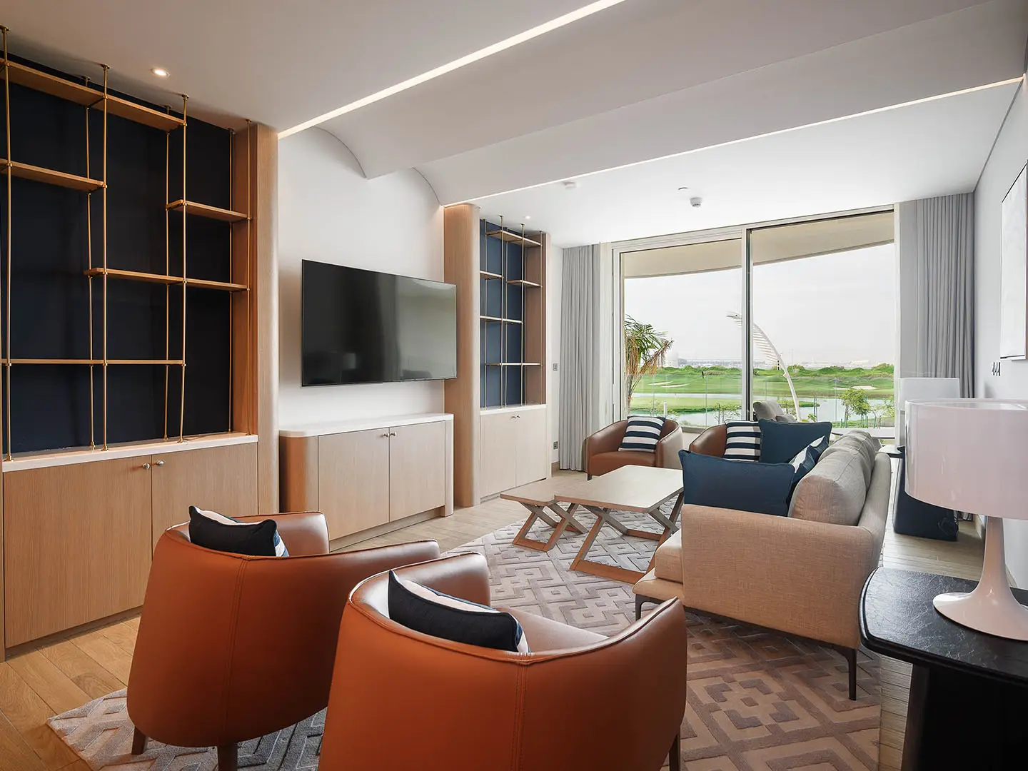 A chic living room with a golf view