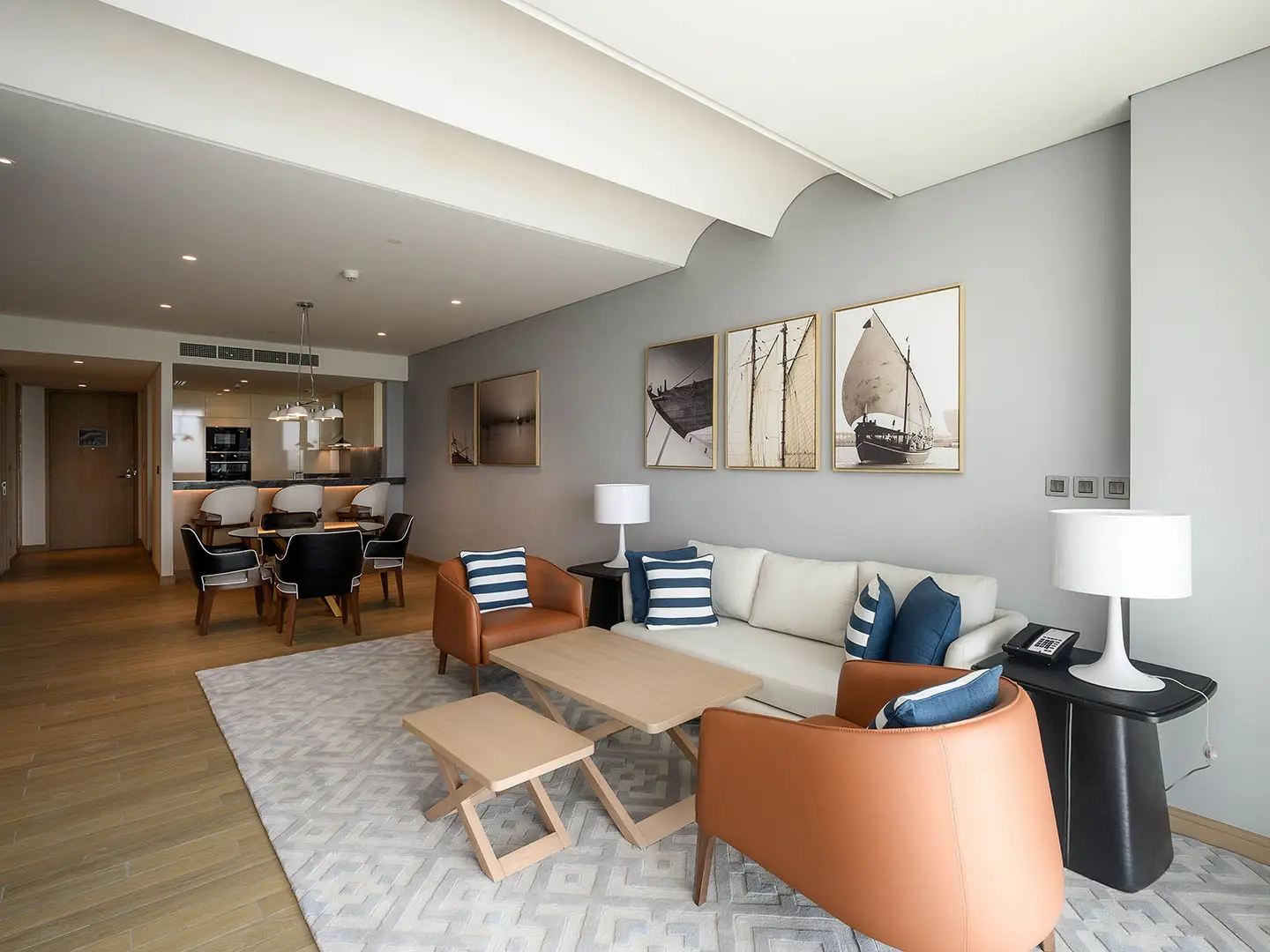 Contemporary living and dining area with art.