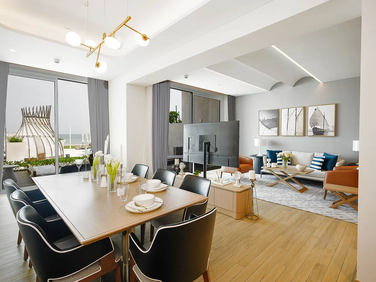 A large open-plan living and dining area with a view.