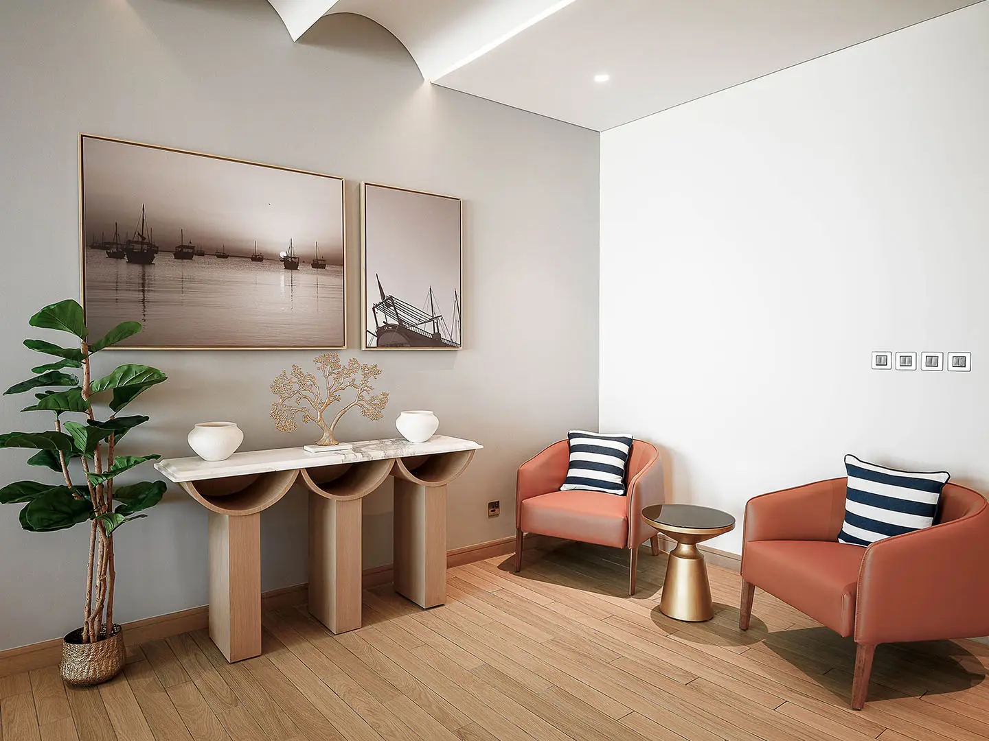 A chic waiting area with nautical art and modern chairs.