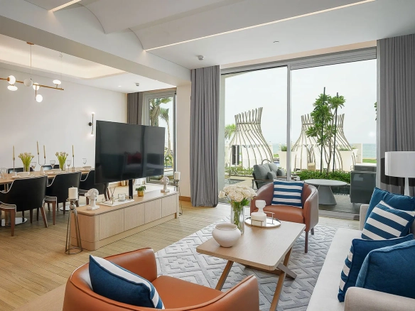 A modern living room with a dining area and patio