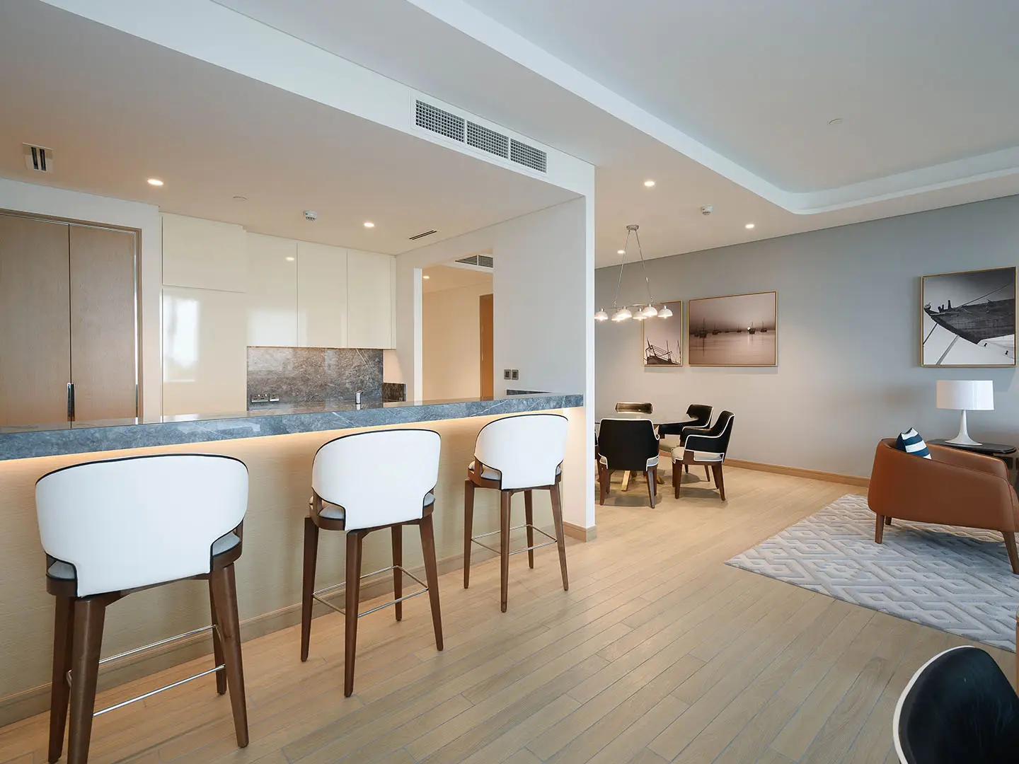 Open kitchen with small dining and cozy seating