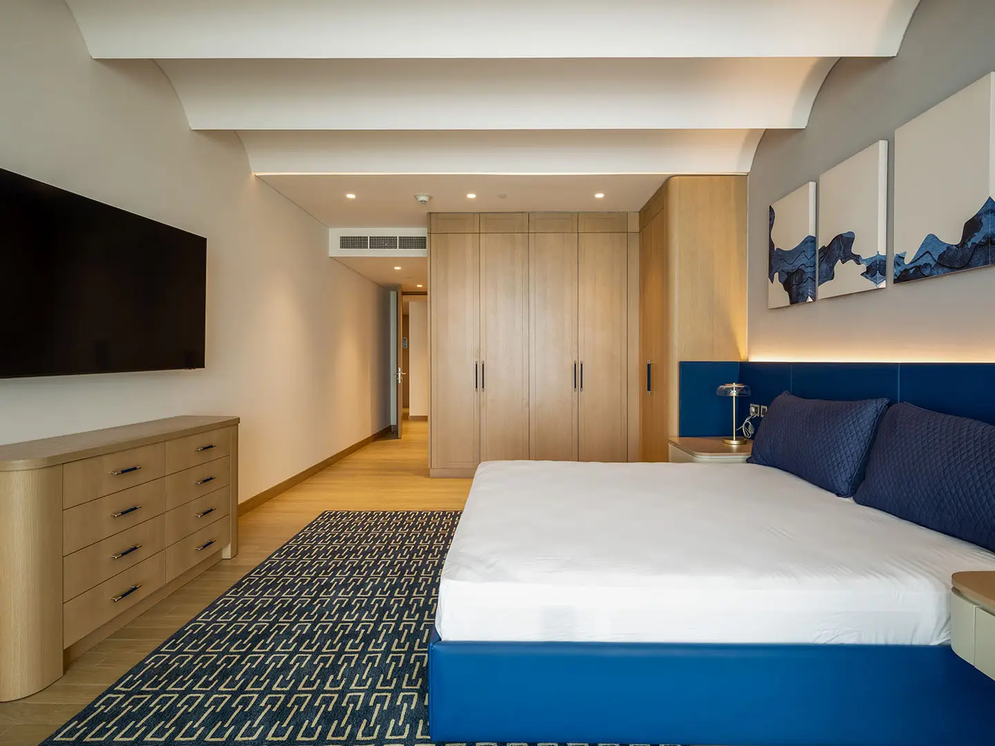 Cozy bedroom with double bed and natural lighting