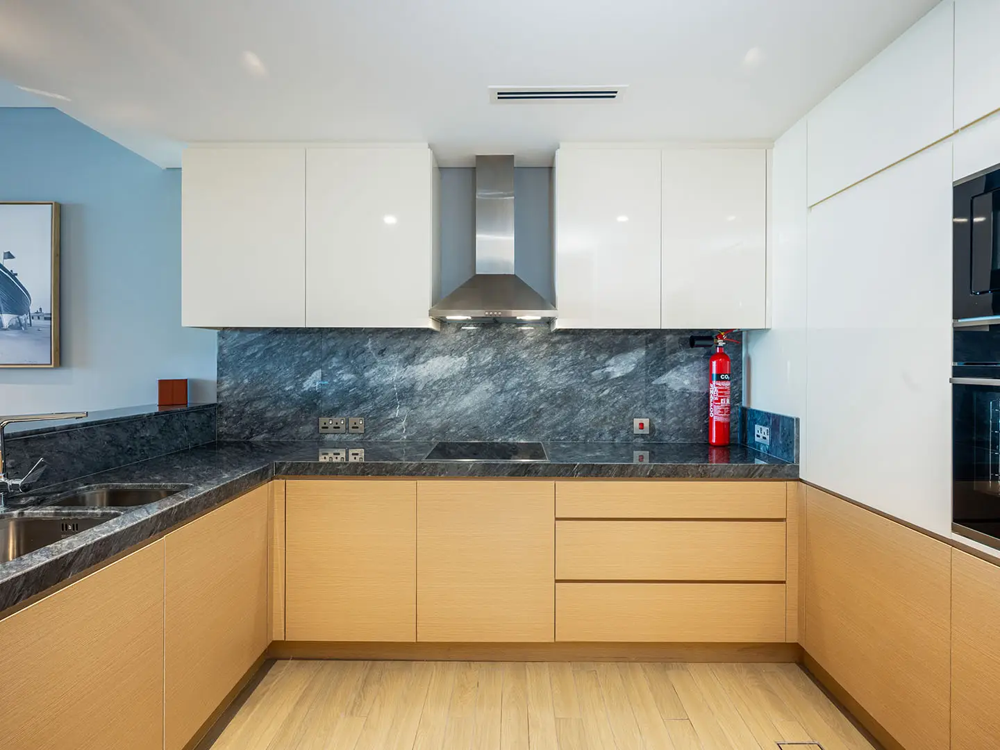 Stylish kitchen with warm wooden modern finishes