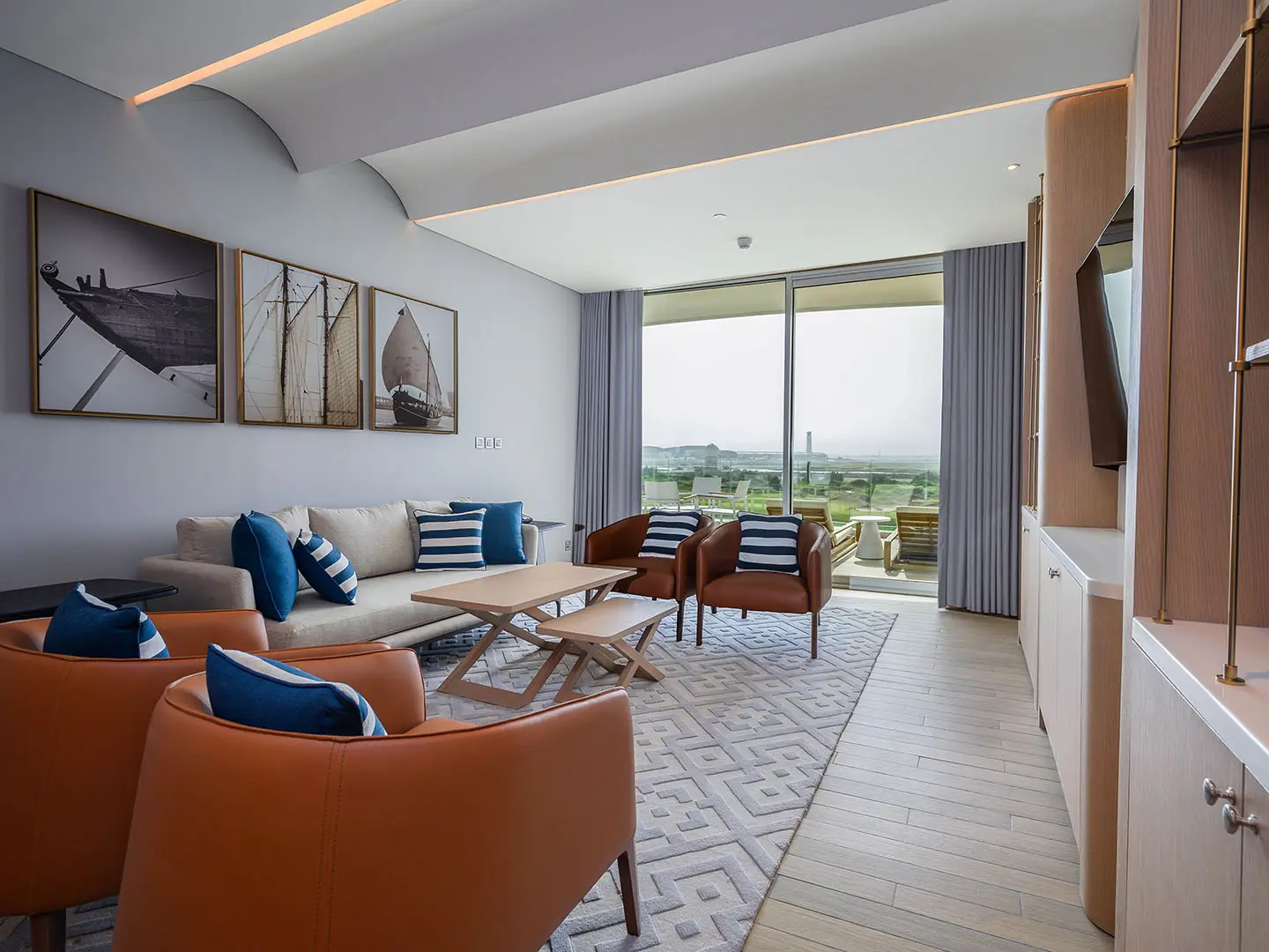 A bright living room with modern decor and a view