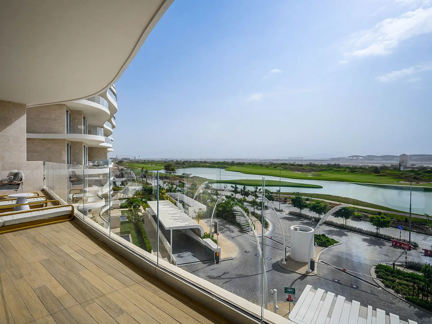 ALMOUJ_324_WEB_NO_WM_0002_ALMOUJ_324-11 Modern balcony with elegant lakefront exterior view