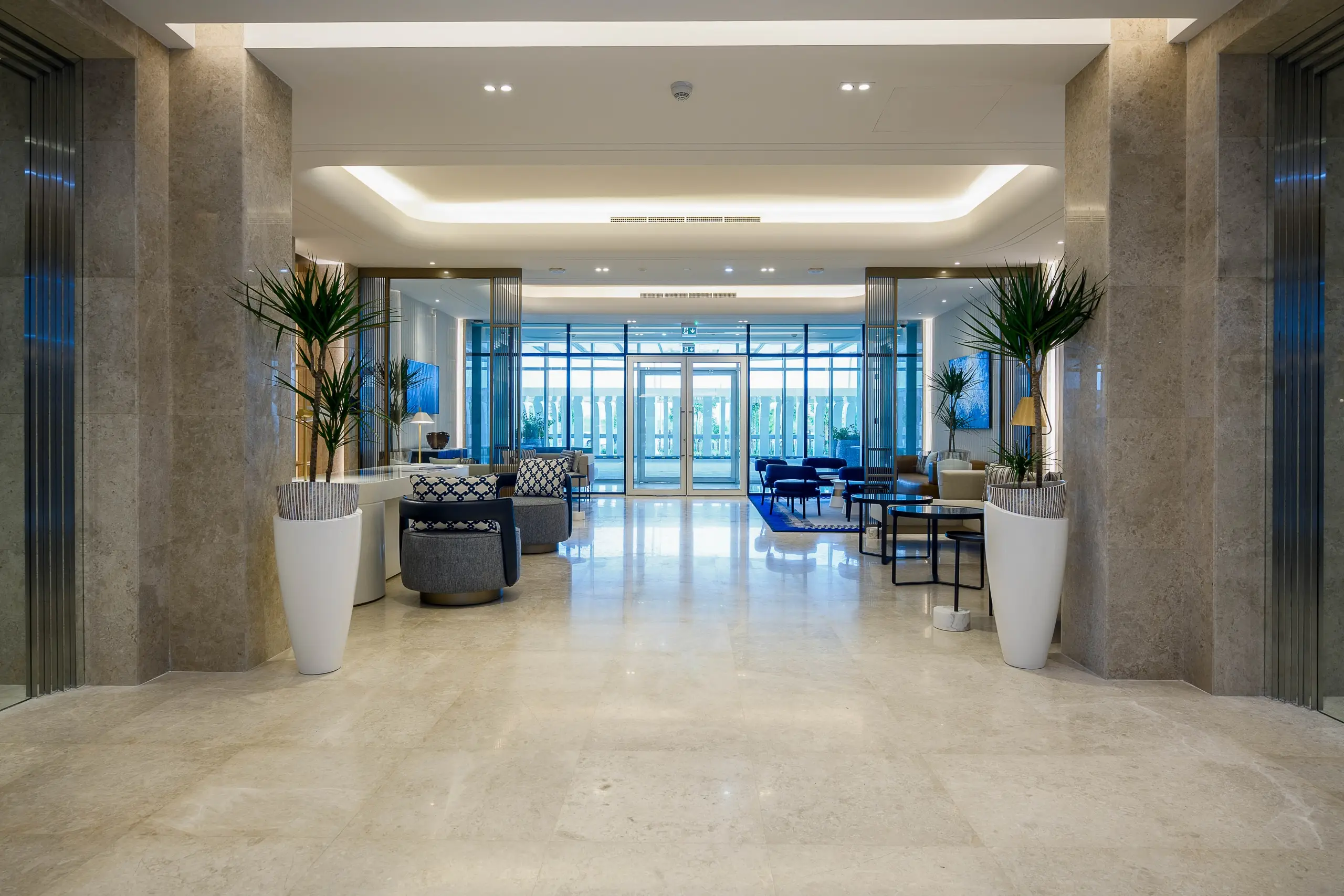 Elegant hotel lobby with warm lighting and decor